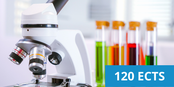 microscopi amb varis tubs de prova de diferents colors a la vora